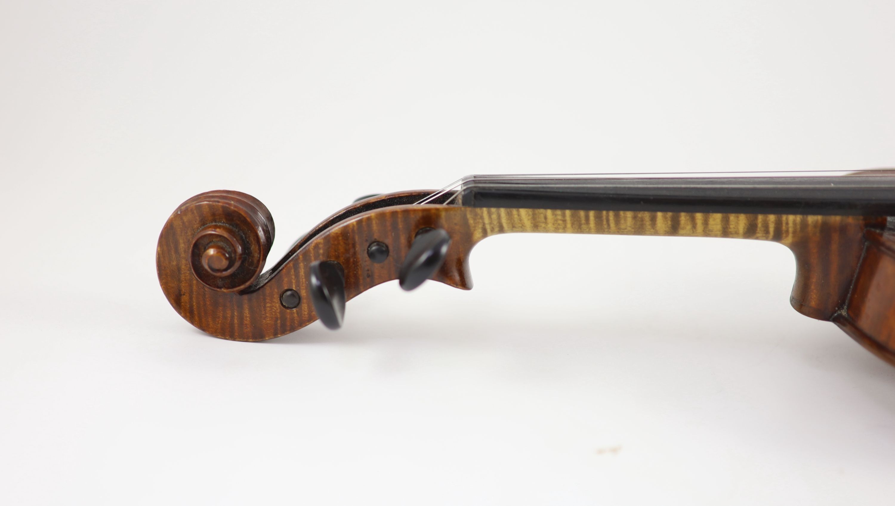 A violin, labelled Georges Cunault / luthier/ 21, Rue de Navarin, Paris An 1900, Length of back 36 cm